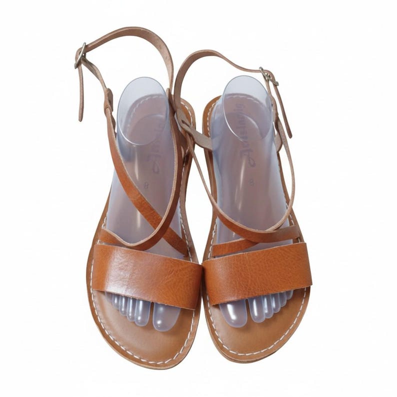 Pure leather flat sandals with ankle strap on shoe form - handmade Morocco